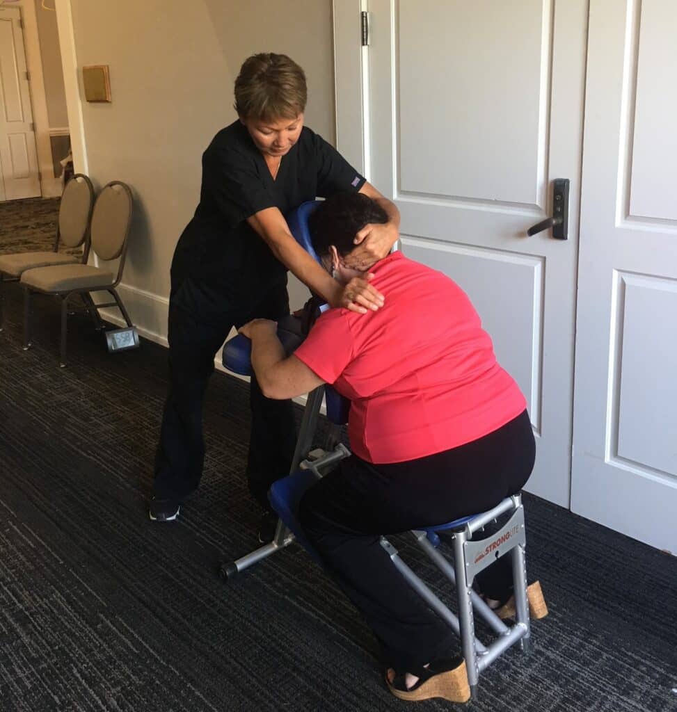 Massology promoting employee wellness with corporate chair massage in Jacksonville.